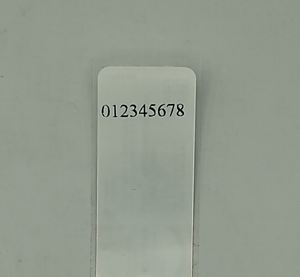 Etiqueta en tapa de botella